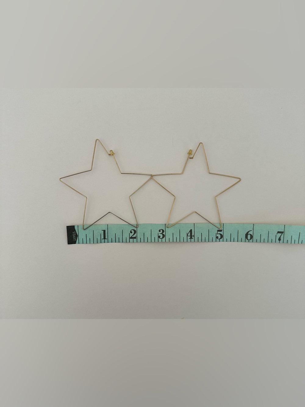 Star Wire Hoop Earrings in Gold Tone